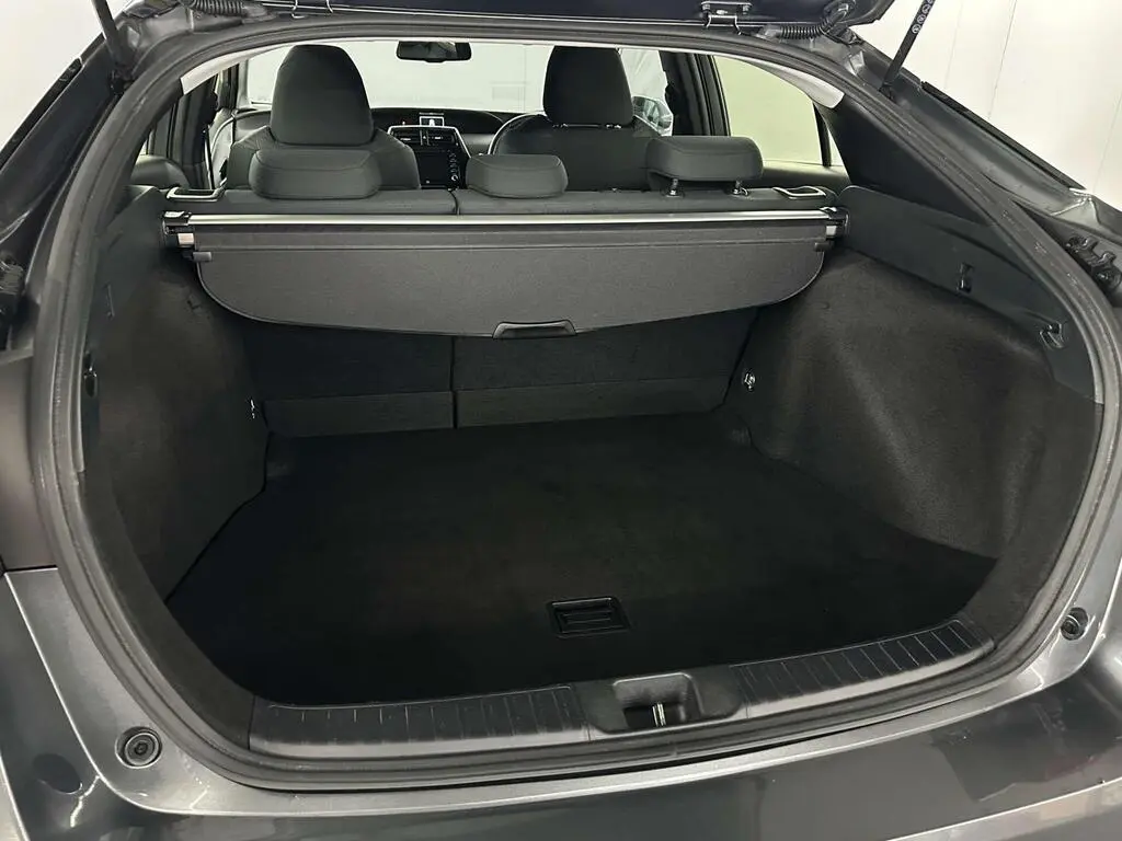 Open boot in economy class vehicle with luggage space for airport and city transfers