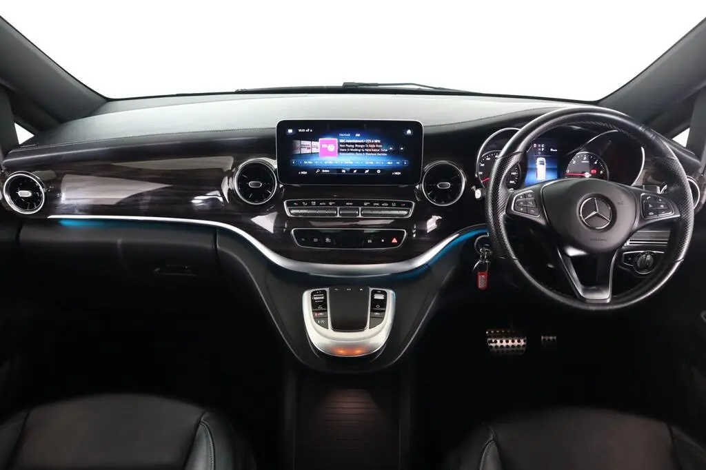 Mercedes V-Class dashboard with wood trim and ambient lighting