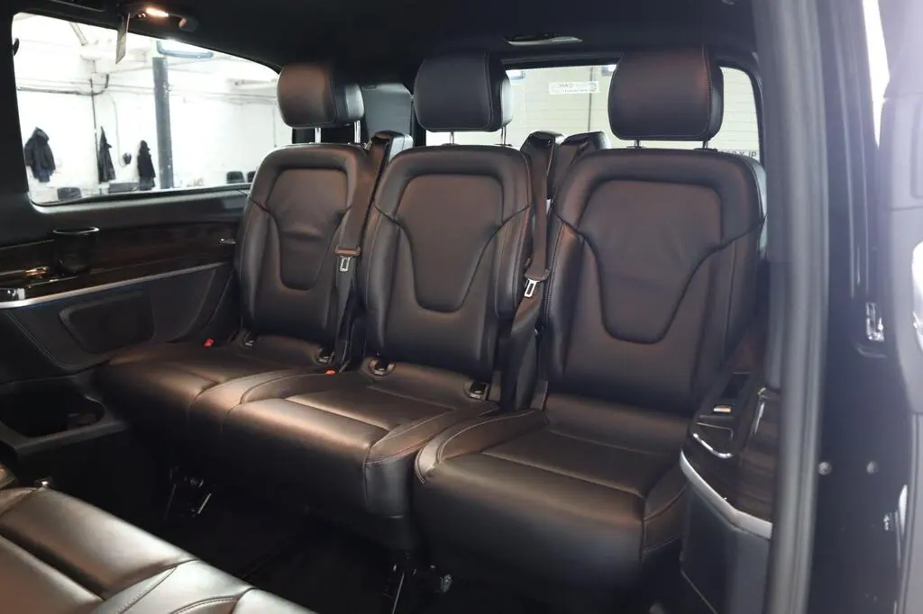 V-Class rear leather seats with dark wood panelling