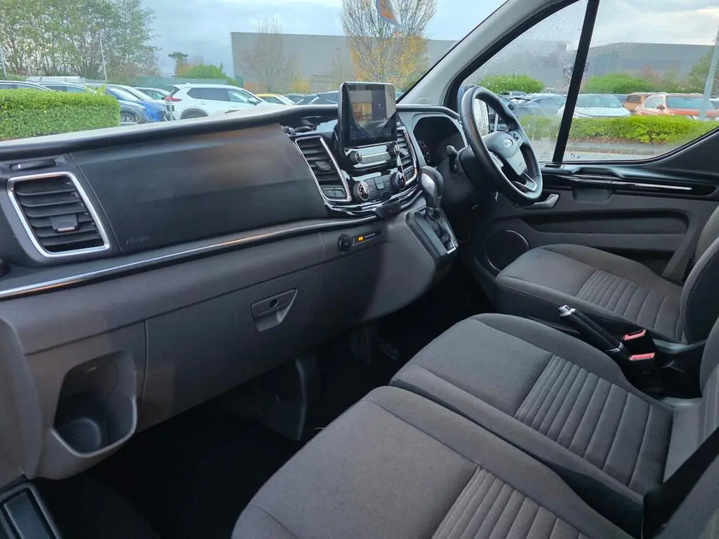 Front cabin of MPV with dashboard and seating
