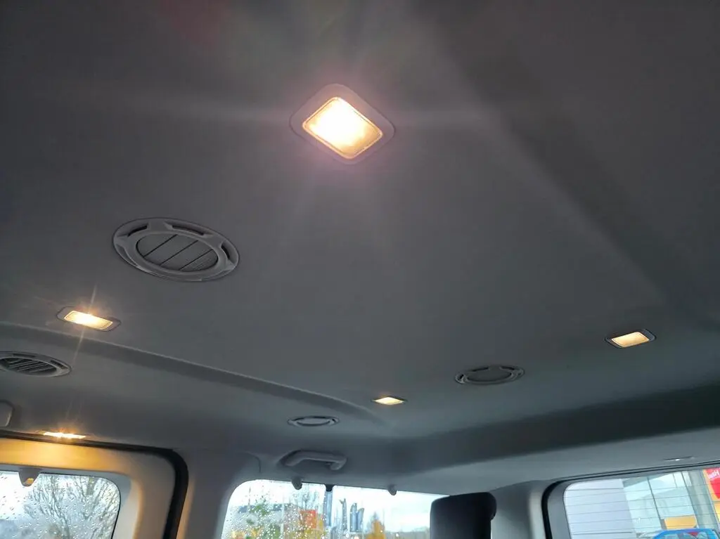 Interior ceiling of MPV with air vents and ambient lighting